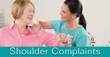 Aching shoulders? Therapist's working with an older lady's sore shoulder.