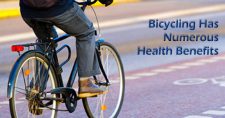 Biking Has Numerous Health Benefits. Picture of a person riding a bicycle.