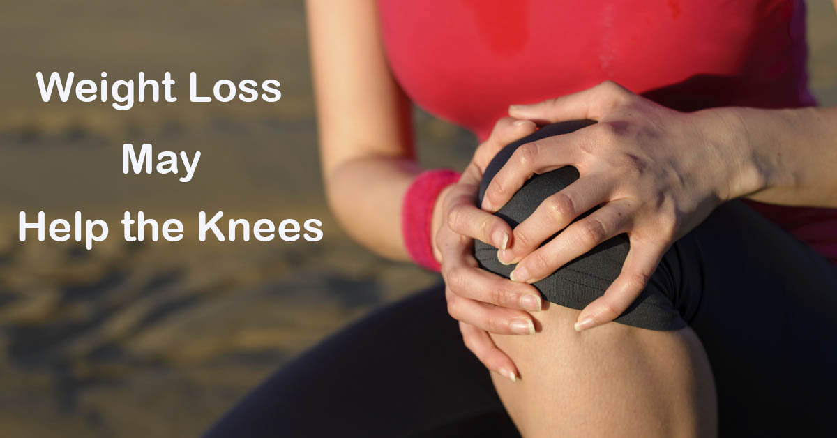 Take a Load Off of Your Knees. Picture of a young caucasian female sitting and holding onto her knee.